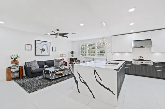 a kitchen with a stove and a refrigerator