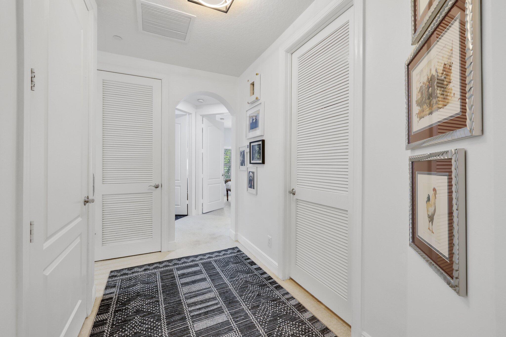 5530 Northeast Trieste Terrace, Unit 5530 Boca Raton, FL 33487 - Photo 49 of 57 a bathroom with a bathtub and shower