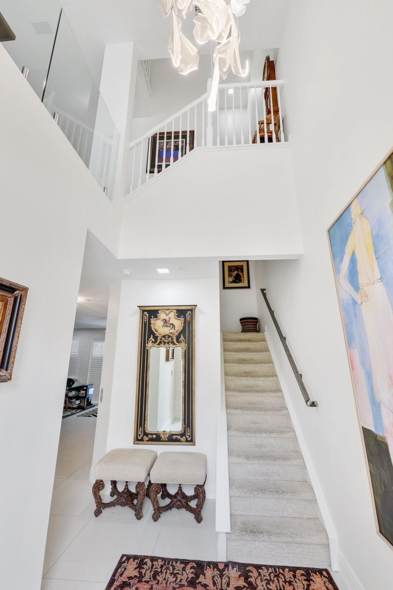 5530 Northeast Trieste Terrace, Unit 5530 Boca Raton, FL 33487 - Photo 7 of 57 a view of entryway and hall