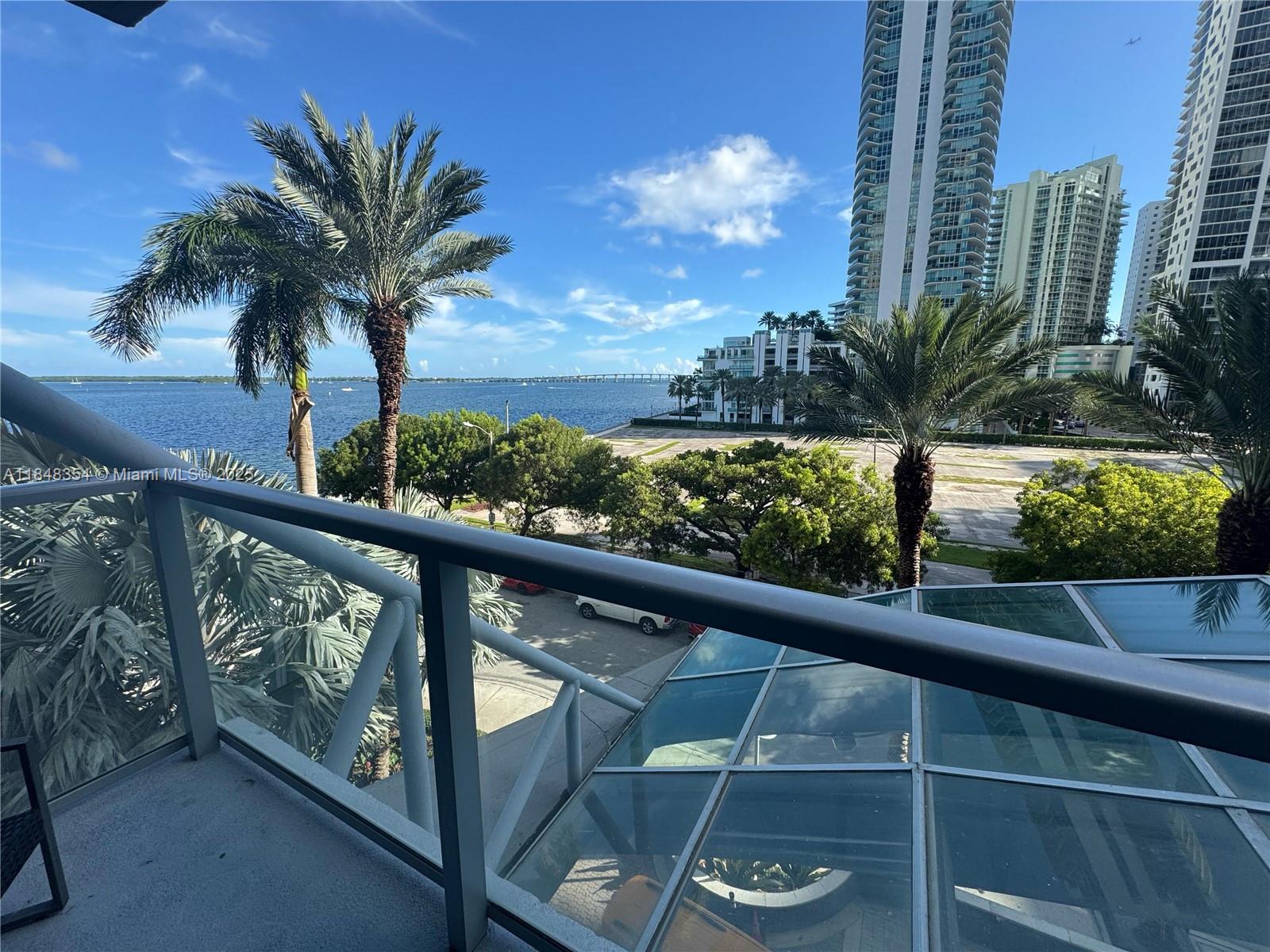 1155 Brickell Bay Drive, Unit 307 Miami, FL 33131 - Photo 22 of 23 a view of balcony with furniture