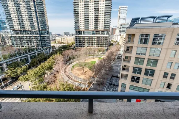 a view of kitchen with furniture and wooden floor