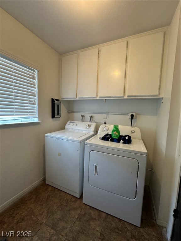 5929 West Cherokee Avenue Las Vegas, NV 89103 - Photo 12 of 30 Laundry room featuring cabinet space and washing machine and clothes dryer