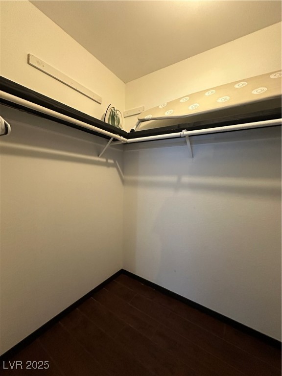 5929 West Cherokee Avenue Las Vegas, NV 89103 - Photo 25 of 30 Walk in closet featuring dark wood-style floors