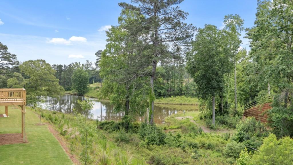 174 Thompson Ridge Lane Dallas, GA 30132 - Photo 12 of 35 a view of a lake with houses