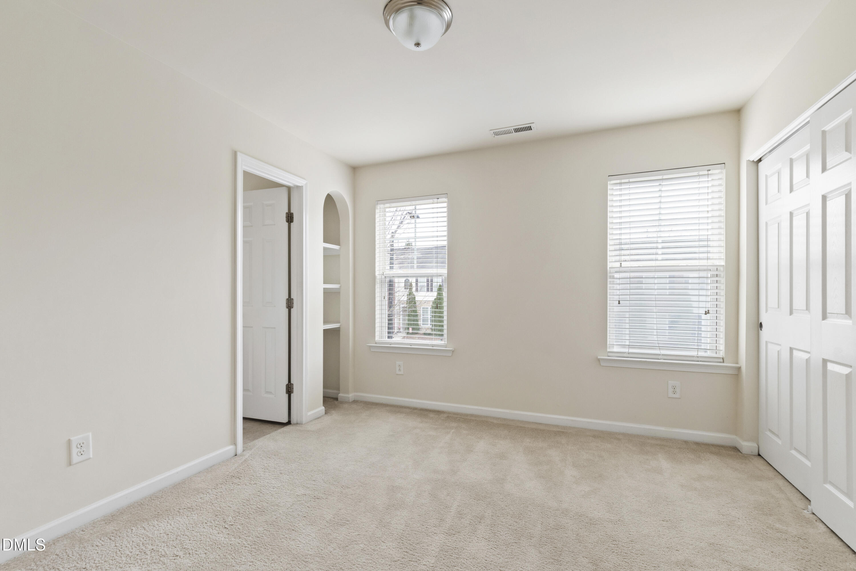 6617 Clarksburg Place Raleigh, NC 27616 - Photo 17 of 30 a view of an empty room with a window