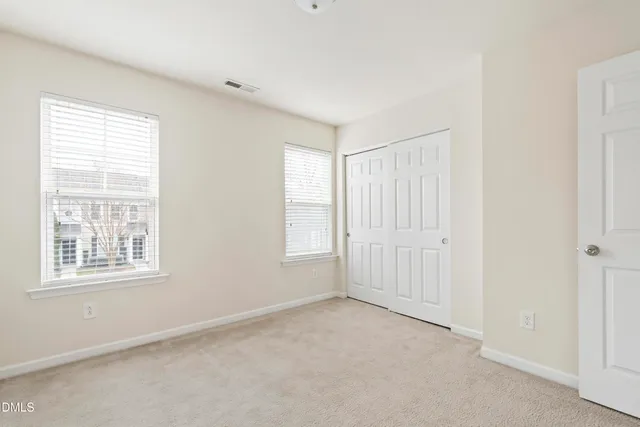 a view of a bedroom with closet area