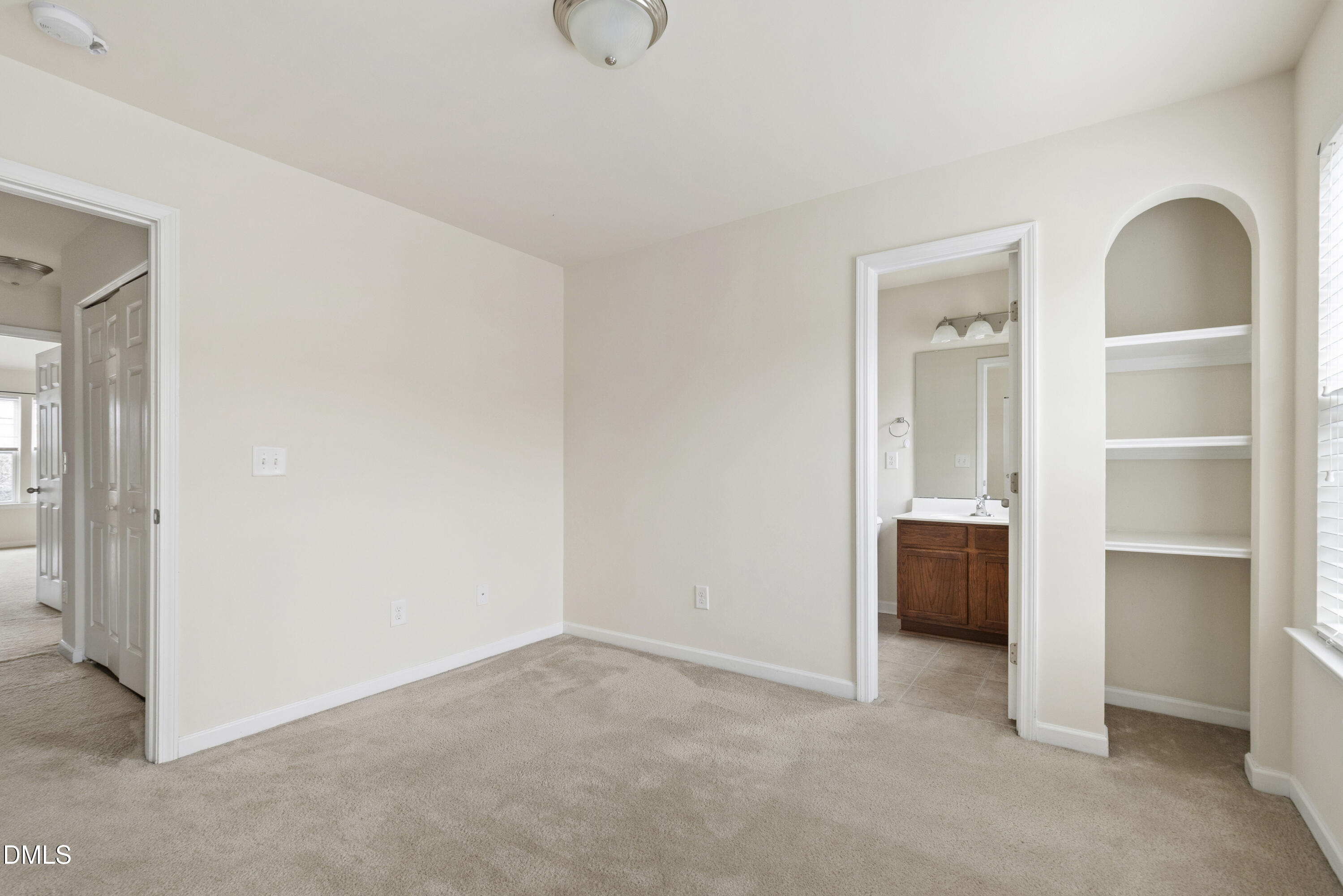 6617 Clarksburg Place Raleigh, NC 27616 - Photo 19 of 30 a view of a bedroom with closet area