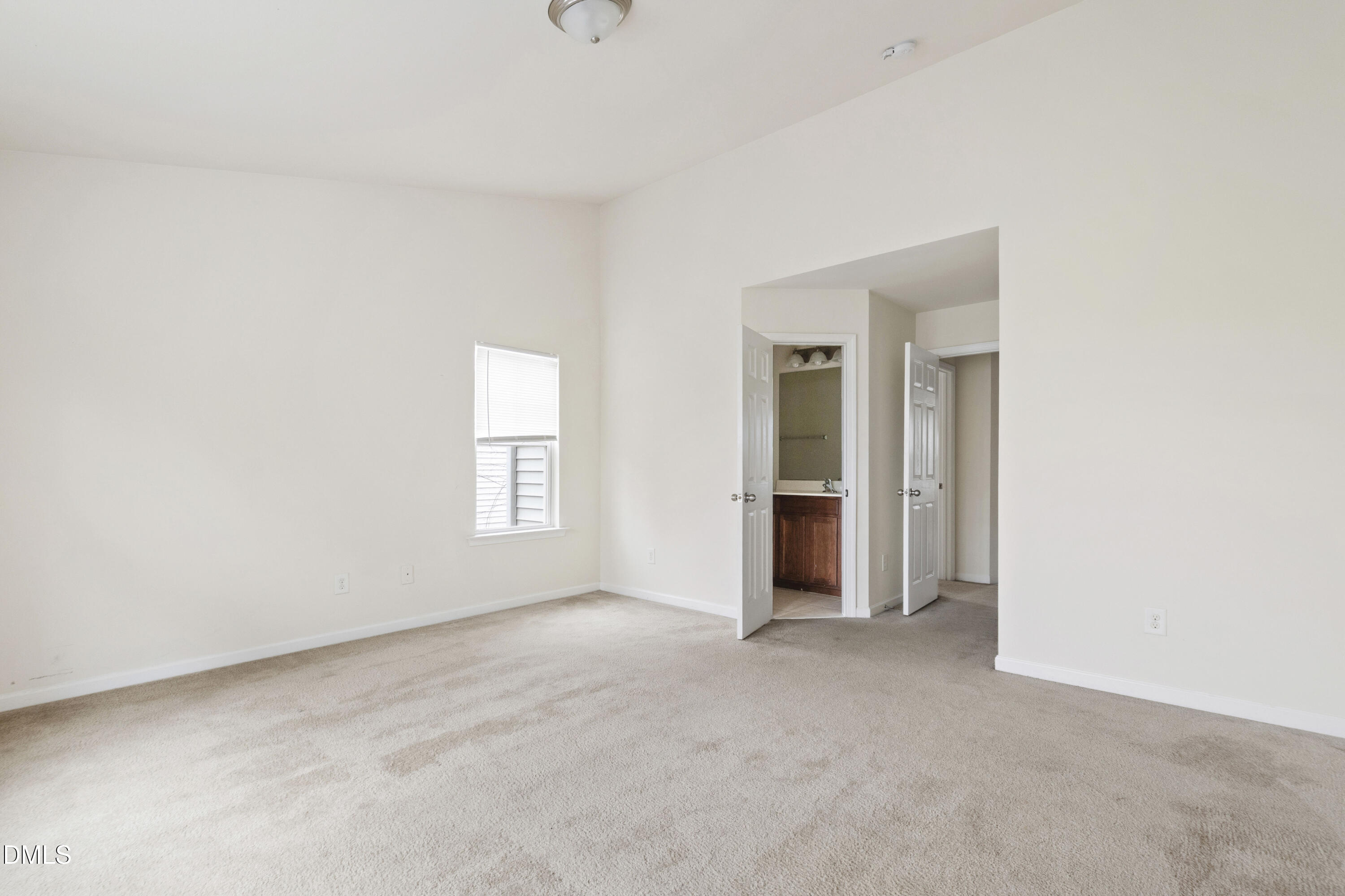 6617 Clarksburg Place Raleigh, NC 27616 - Photo 26 of 30 an empty room with windows and closet