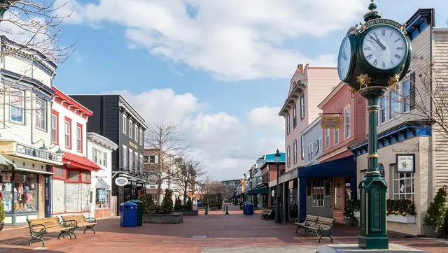 a view of a patio with table and chairs and a fire pit