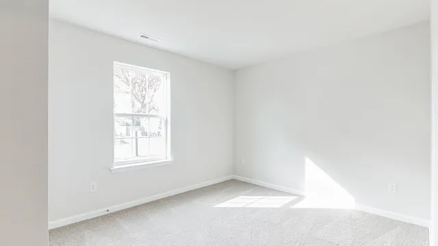 an empty room with a window