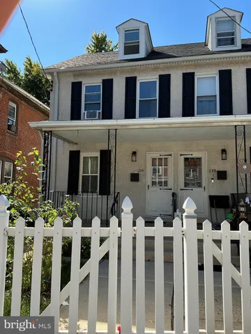 a front view of house with white door