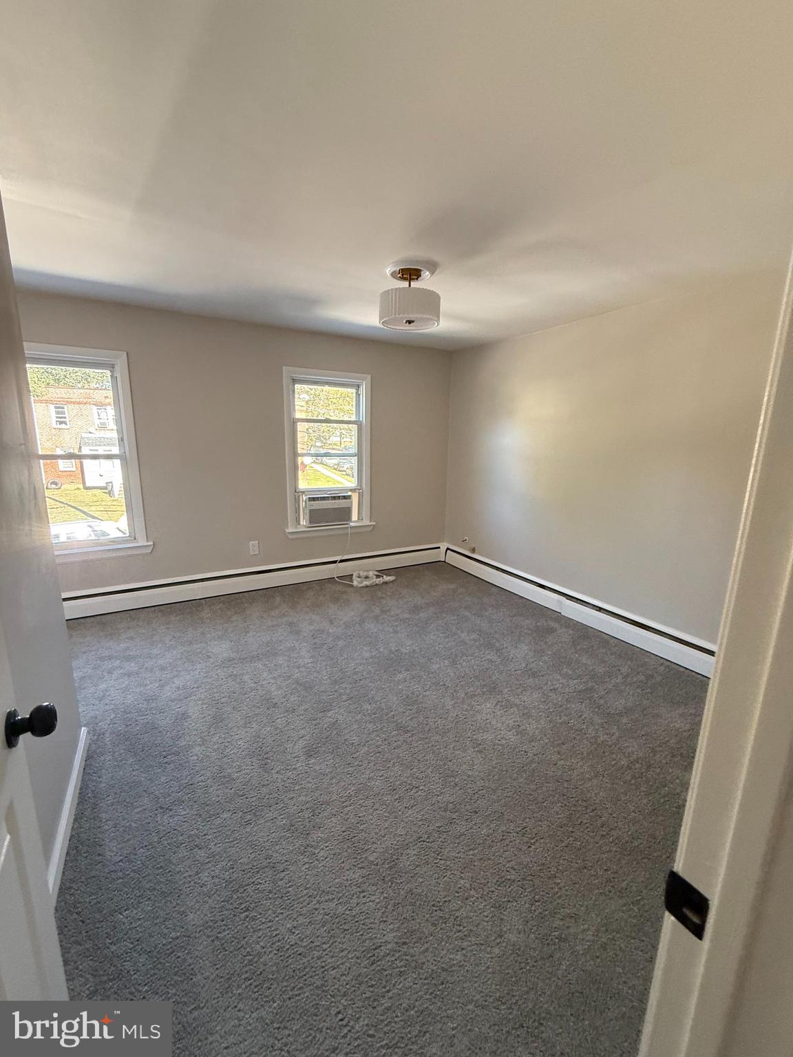 241 Fairview Road Crum Lynne, PA 19022 - Photo 11 of 34 an empty room with windows and closet