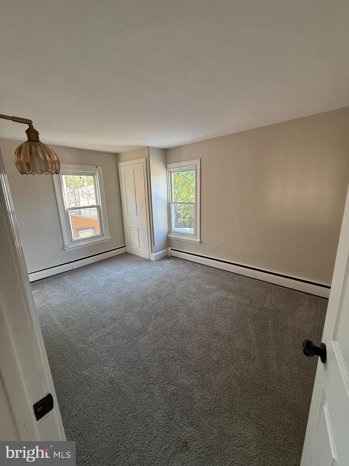 241 Fairview Road Crum Lynne, PA 19022 - Photo 14 of 34 a view of empty room with windows