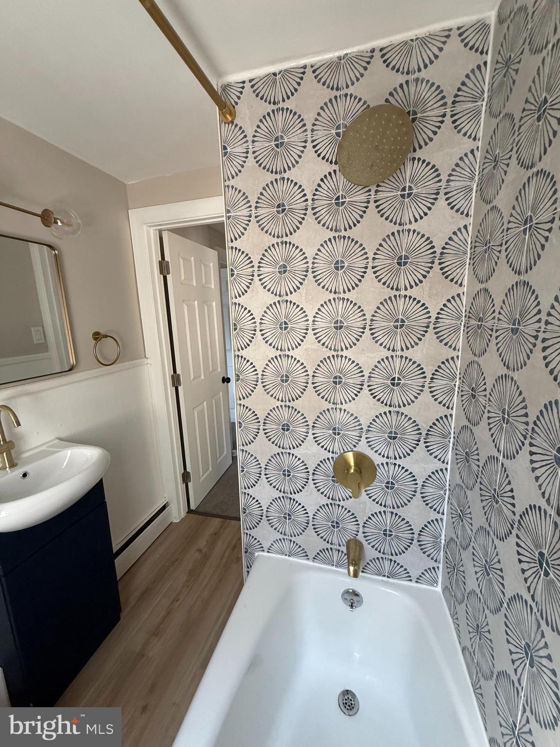 241 Fairview Road Crum Lynne, PA 19022 - Photo 15 of 34 a bathroom with a sink and a mirror