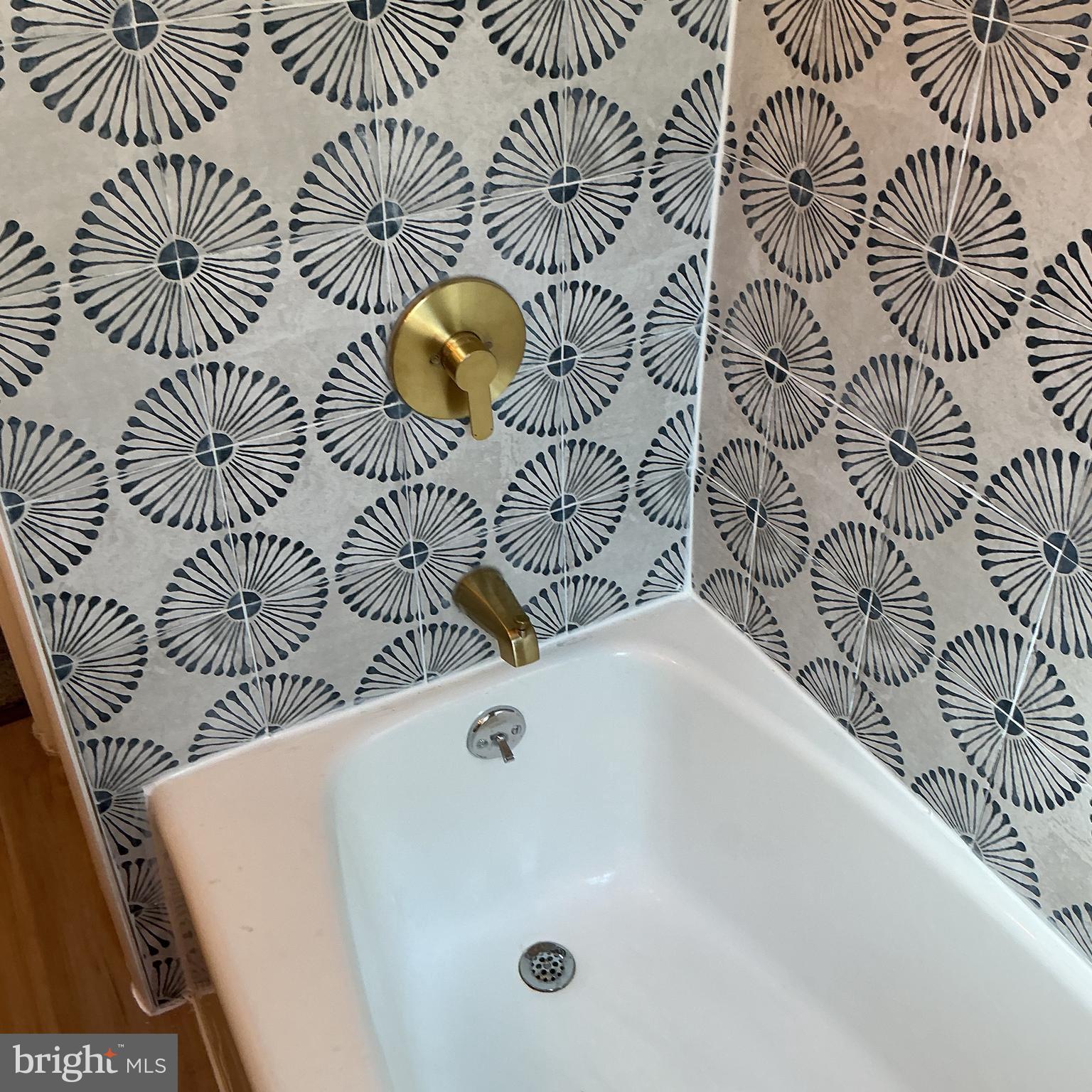 241 Fairview Road Crum Lynne, PA 19022 - Photo 18 of 34 a bathroom with a bathtub and a shower