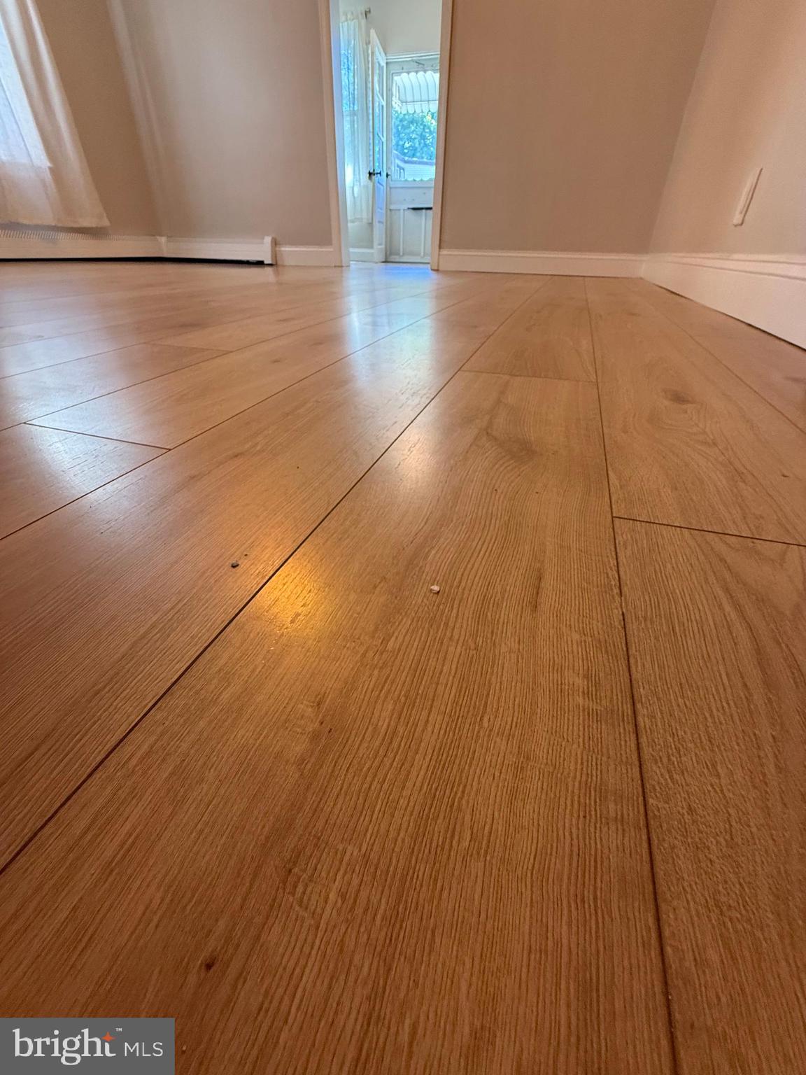 241 Fairview Road Crum Lynne, PA 19022 - Photo 7 of 34 a view of a hallway with wooden floor