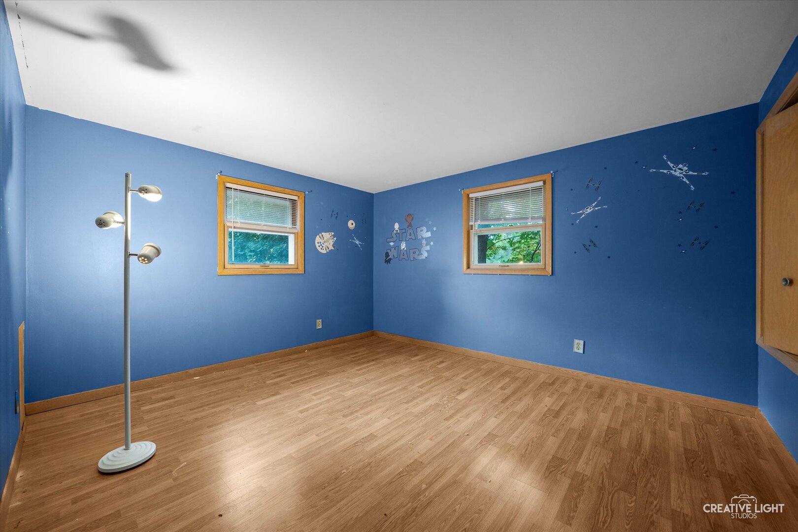 754 Haish Boulevard DeKalb, IL 60115 - Photo 13 of 20 a view of a room with gym equipment and wooden floor