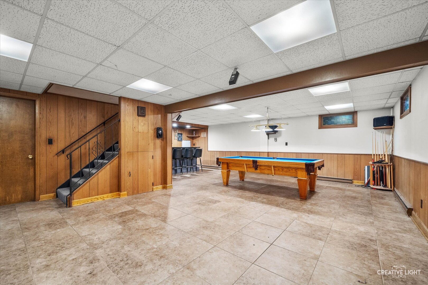 754 Haish Boulevard DeKalb, IL 60115 - Photo 16 of 20 a room with table and stairs