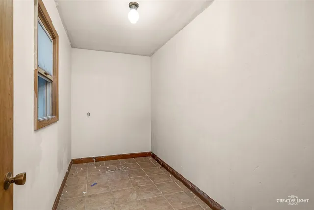 a room with furniture and a window