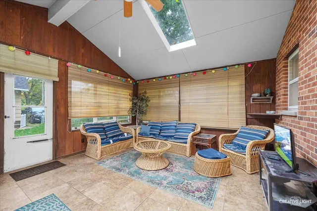 a bedroom with bed and a window