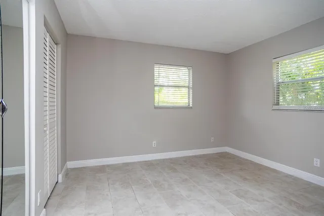 an empty room with windows