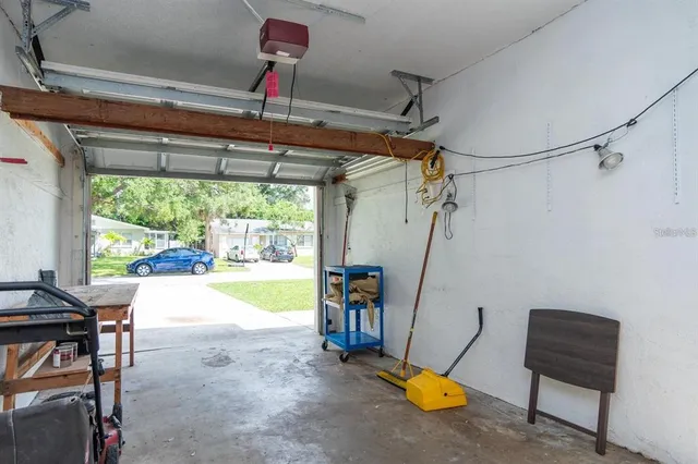 a view of a room with furniture water heater and wooden floor