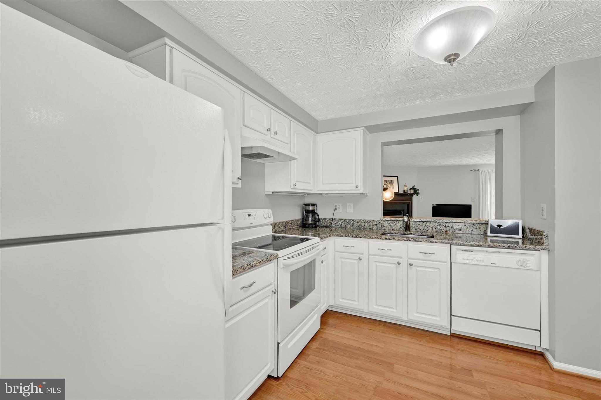 8534 Rhuddlan Road Nottingham, MD 21236 - Photo 8 of 26 Kitchen with Pass-Thru to Family Room