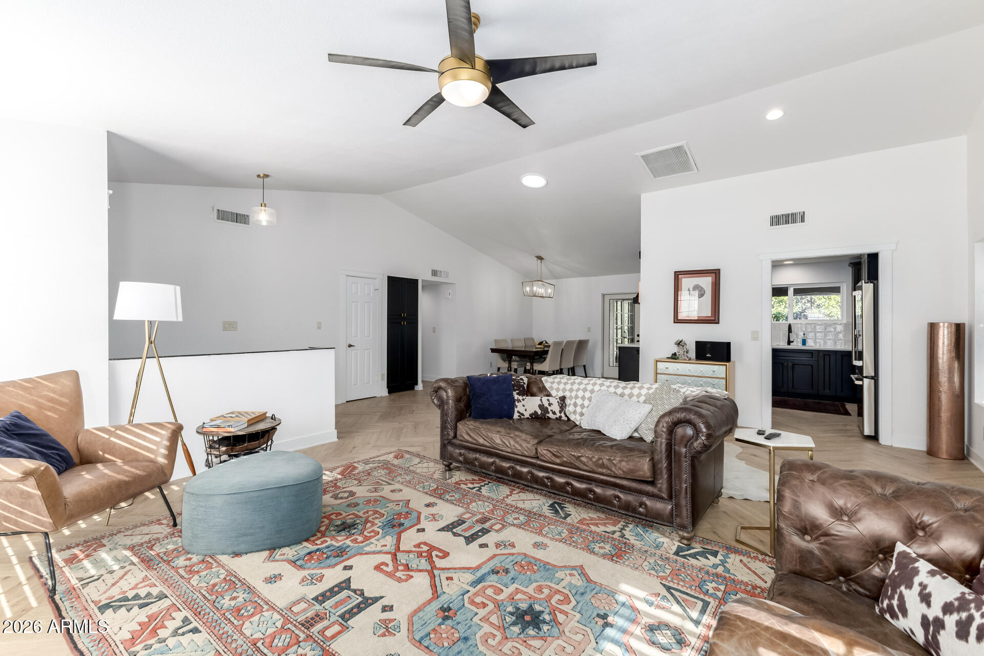 436 East Bluebell Lane Tempe, AZ 85288 - Photo 13 of 59 a living room with furniture and a chandelier
