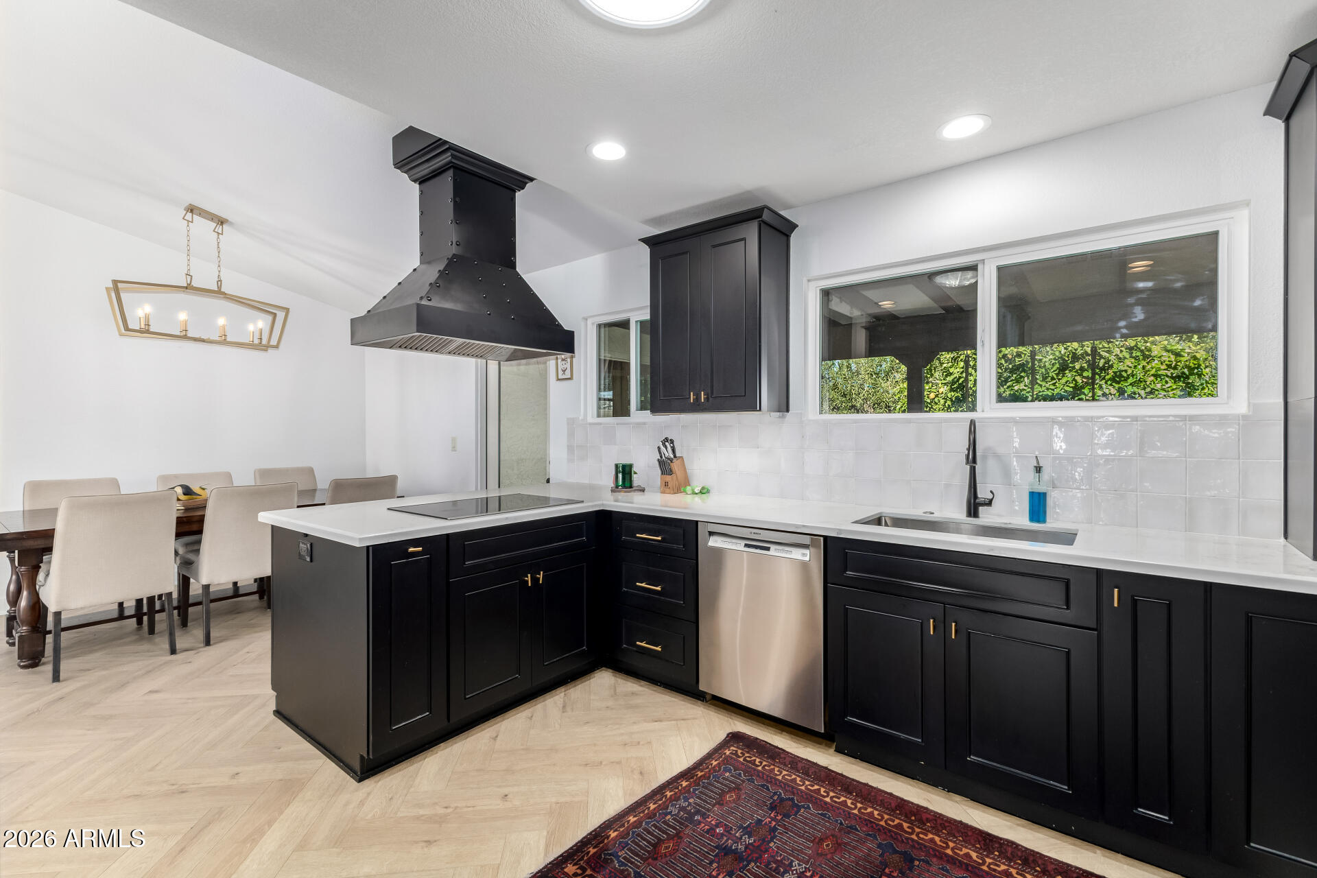 436 East Bluebell Lane Tempe, AZ 85288 - Photo 20 of 59 a kitchen with stainless steel appliances granite countertop a sink and a stove
