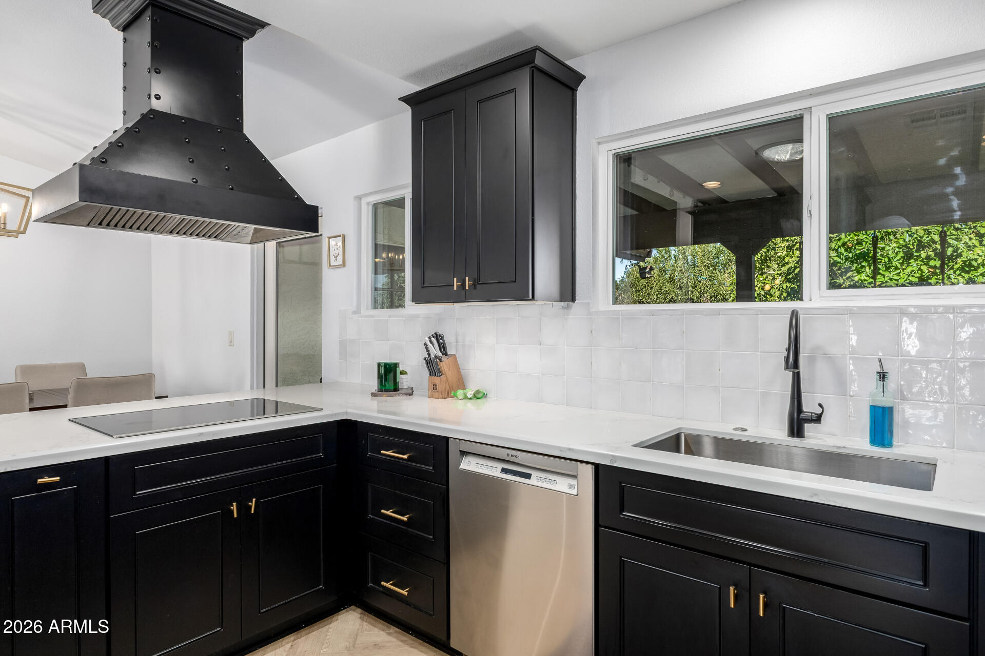 436 East Bluebell Lane Tempe, AZ 85288 - Photo 21 of 59 a kitchen with a sink and a stove