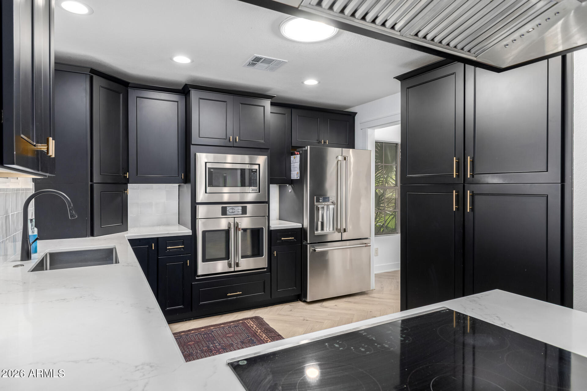 436 East Bluebell Lane Tempe, AZ 85288 - Photo 22 of 59 a kitchen with stainless steel appliances granite countertop a refrigerator and a sink