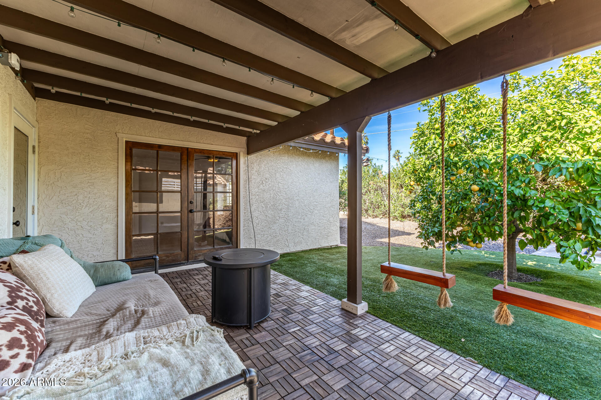 436 East Bluebell Lane Tempe, AZ 85288 - Photo 36 of 59 a view of a porch with furniture and garden