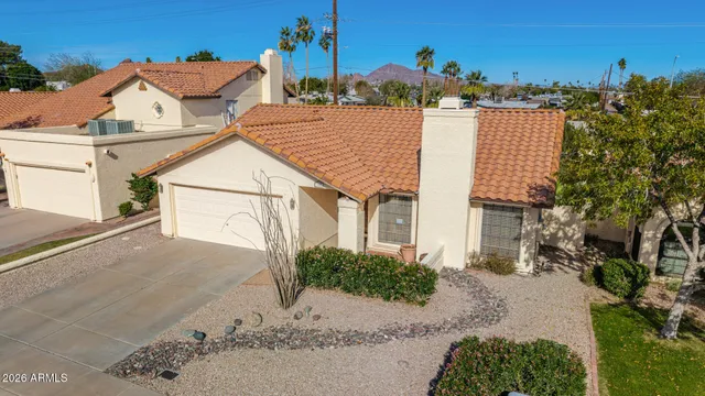 an aerial view of a city with houses