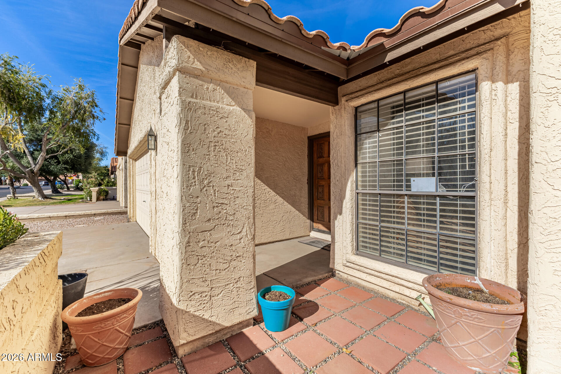 436 East Bluebell Lane Tempe, AZ 85288 - Photo 6 of 59 a view of a patio with table and chairs and a barbeque