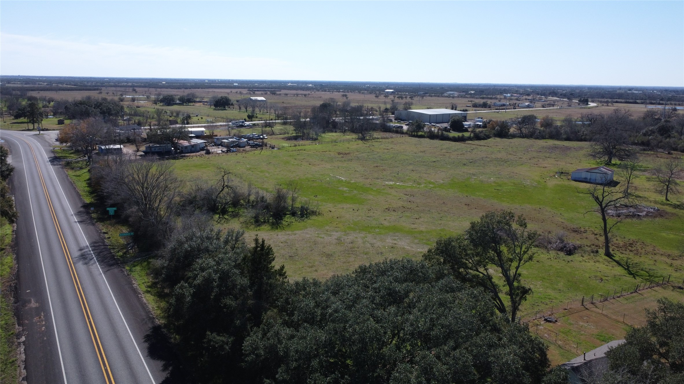13227 Fm 359 Road Hempstead, TX 77445 - Photo 3 of 9 a view of a lake with a city