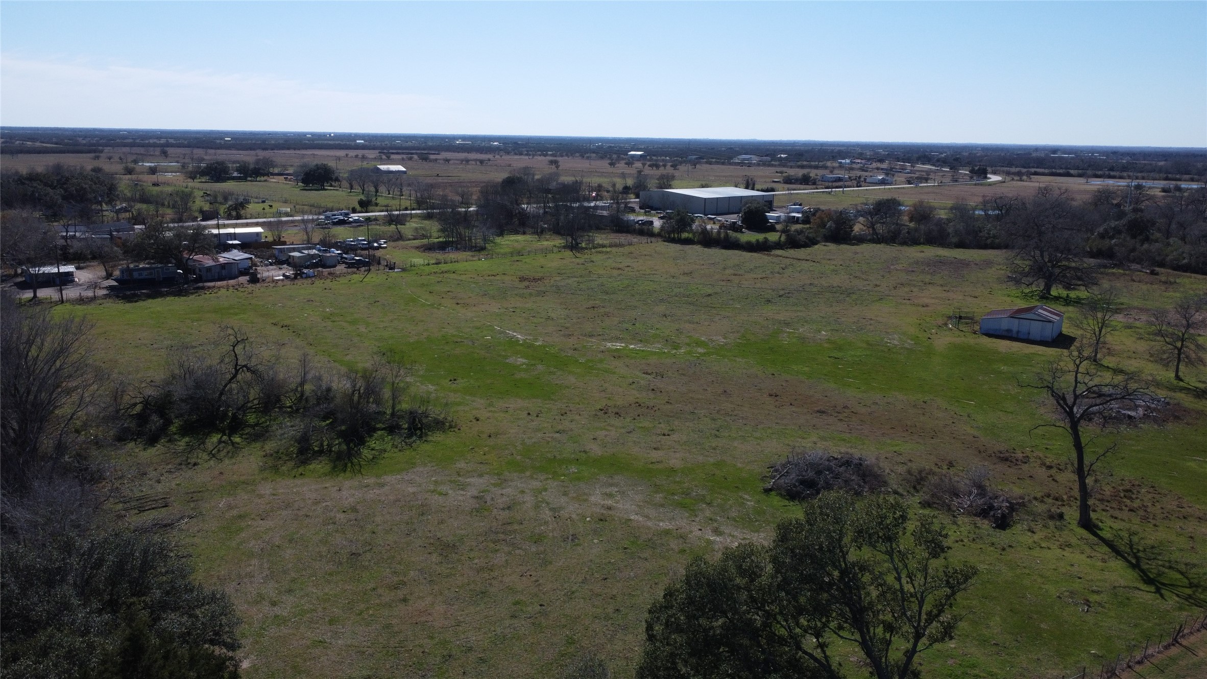 13227 Fm 359 Road Hempstead, TX 77445 - Photo 5 of 9 a view of a lake with houses