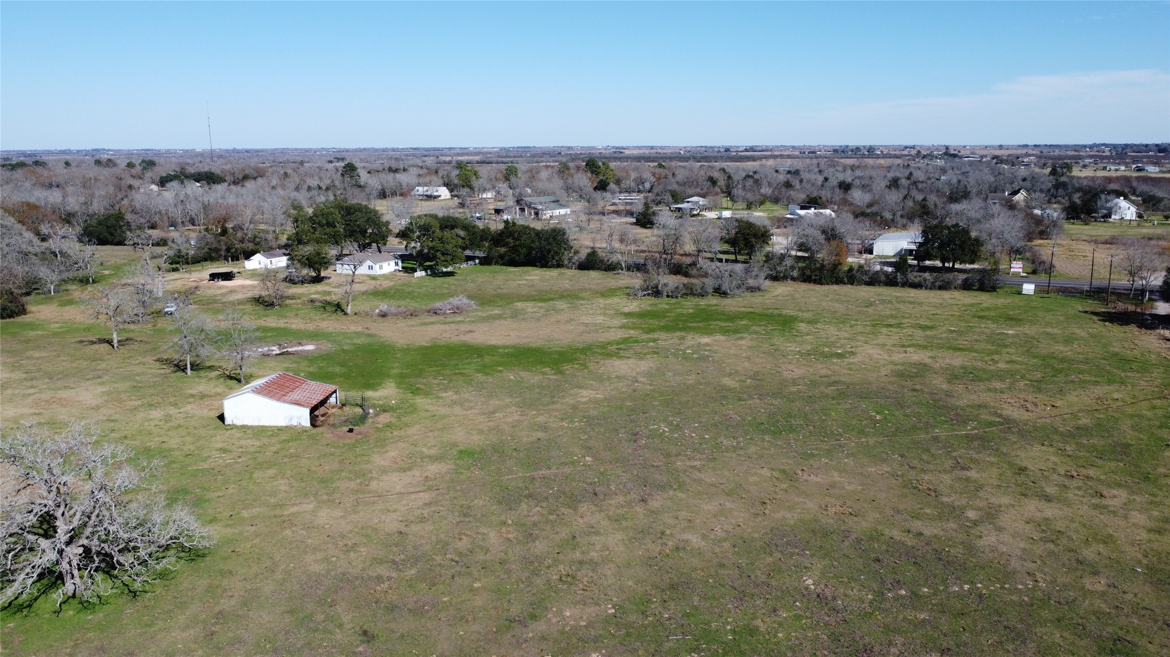 13227 Fm 359 Road Hempstead, TX 77445 - Photo 7 of 9 a view of a town with mountains in the background