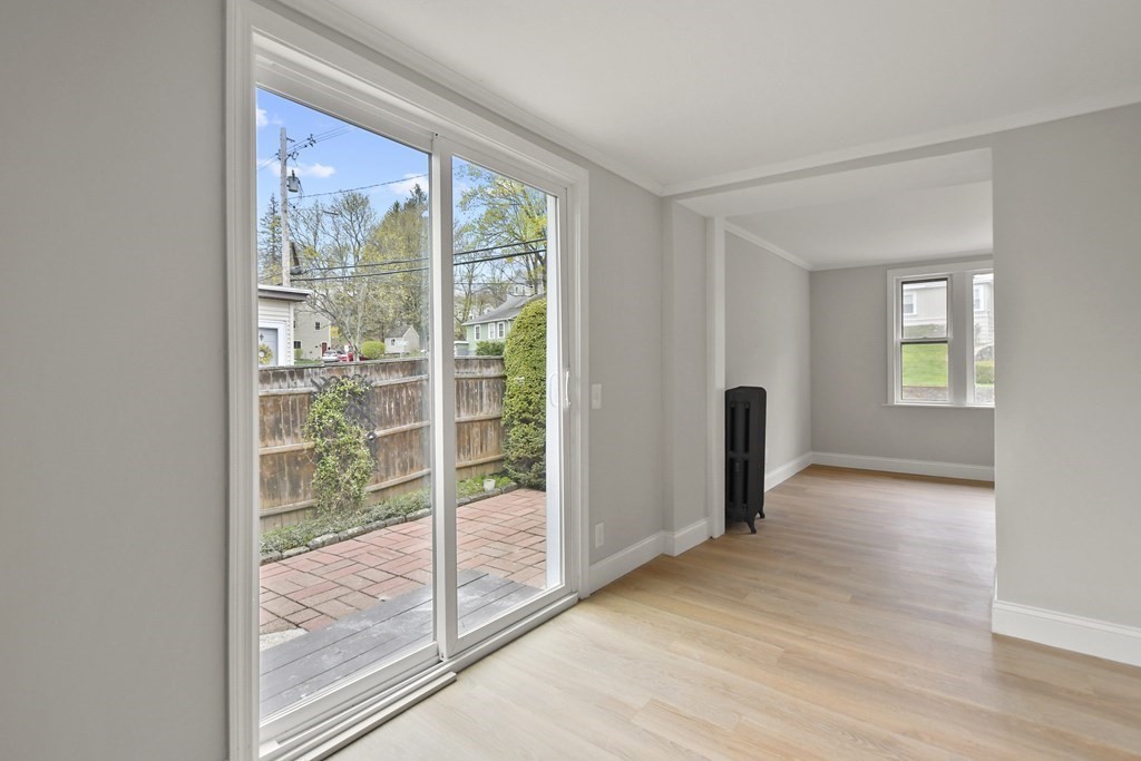 90 Manning Street Hudson, MA 01749 - Photo 11 of 33 a view of empty room with wooden floor and fan