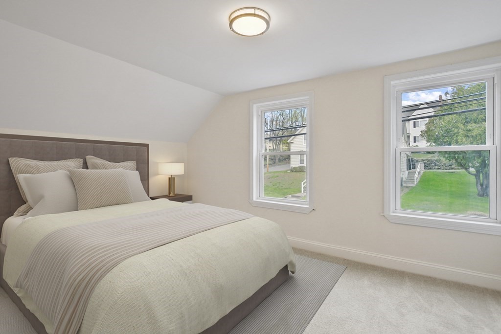 90 Manning Street Hudson, MA 01749 - Photo 15 of 33 a bedroom with a bed and a window