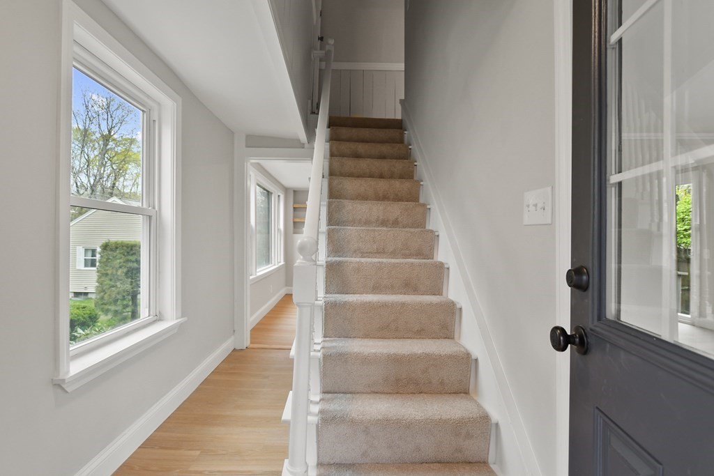 90 Manning Street Hudson, MA 01749 - Photo 2 of 33 a view of staircase with white walls and windows