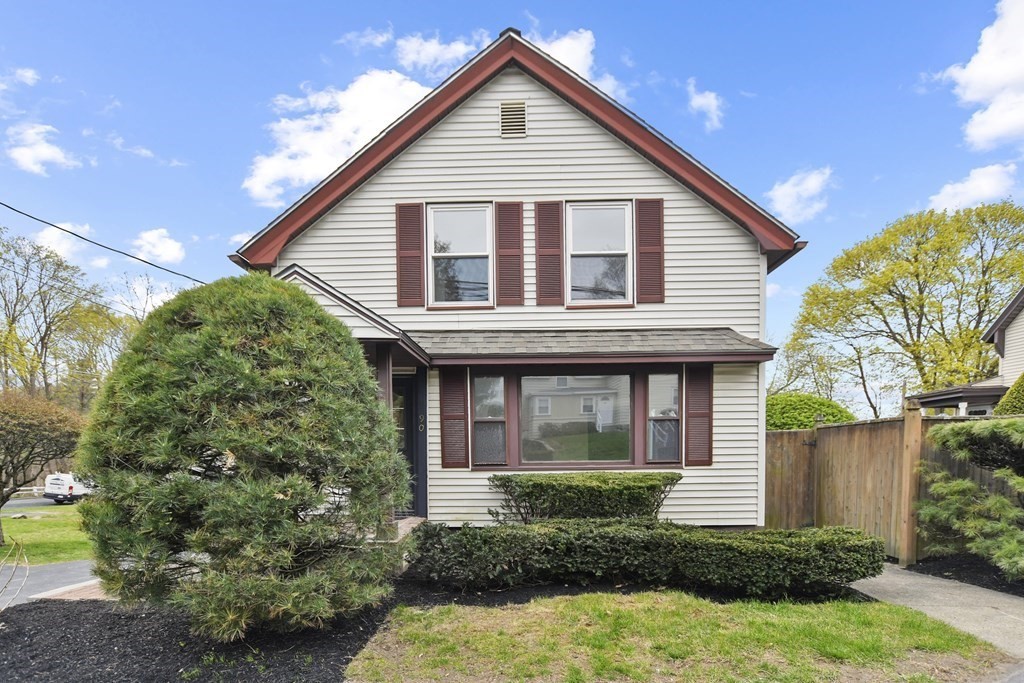 90 Manning Street Hudson, MA 01749 - Photo 25 of 33 a front view of a house with garden