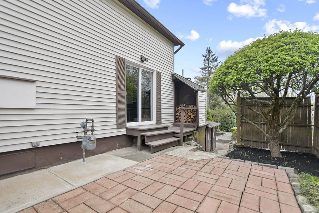 90 Manning Street Hudson, MA 01749 - Photo 28 of 33 a backyard of a house with seating space