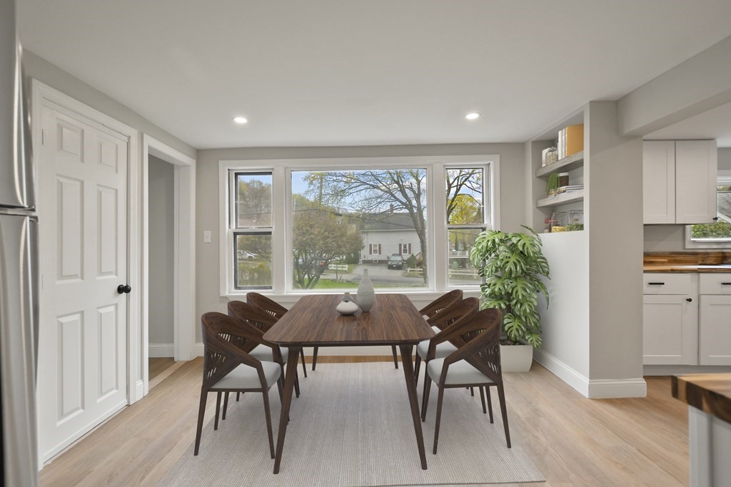 90 Manning Street Hudson, MA 01749 - Photo 9 of 33 a view of a dining room with furniture window and outside view