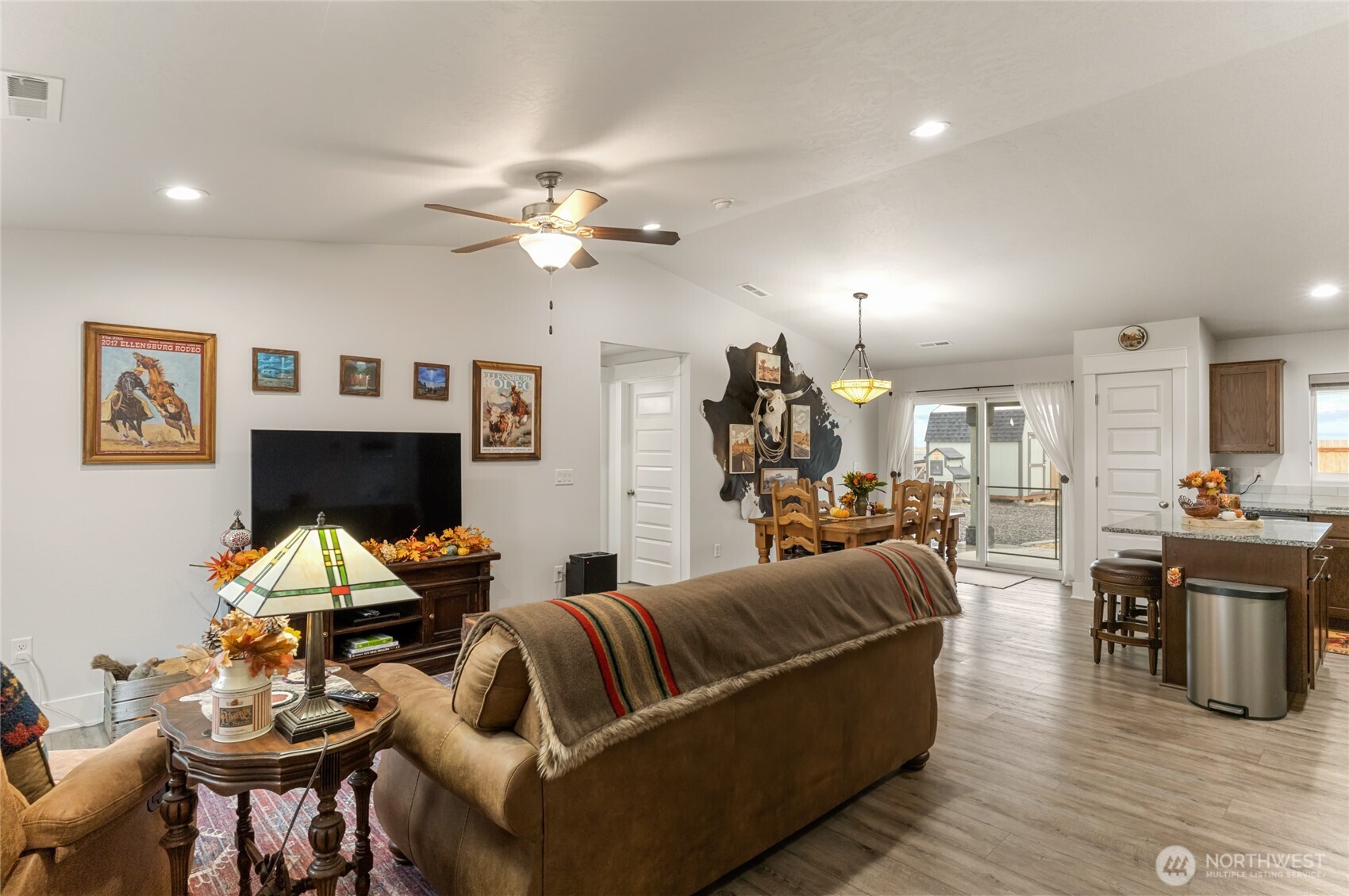 928 Q Street Southwest Quincy, WA 98848 - Photo 5 of 26 a living room with furniture a fireplace and wooden floor