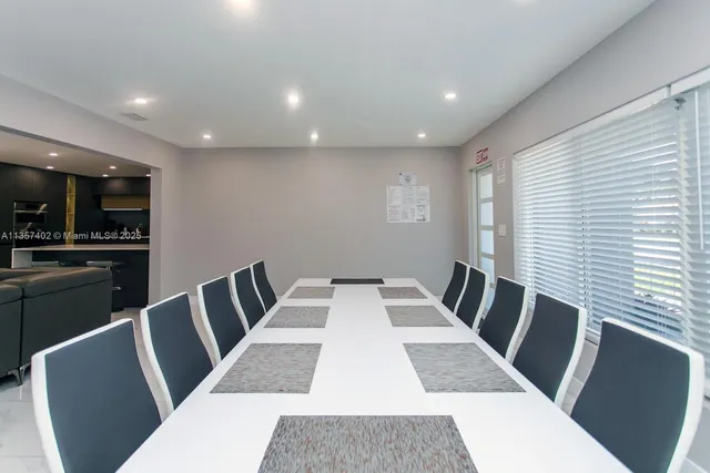 a view of a dining room with furniture