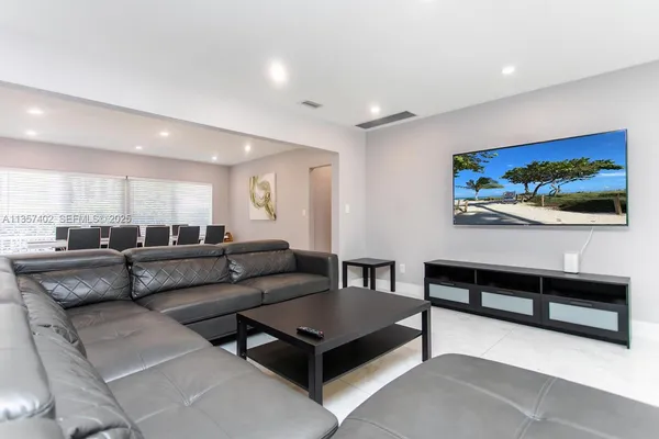 a kitchen with stainless steel appliances a refrigerator and a sink