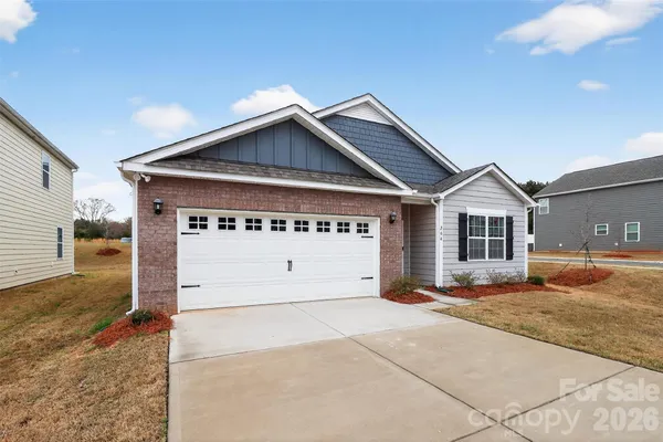 a view of house with garage