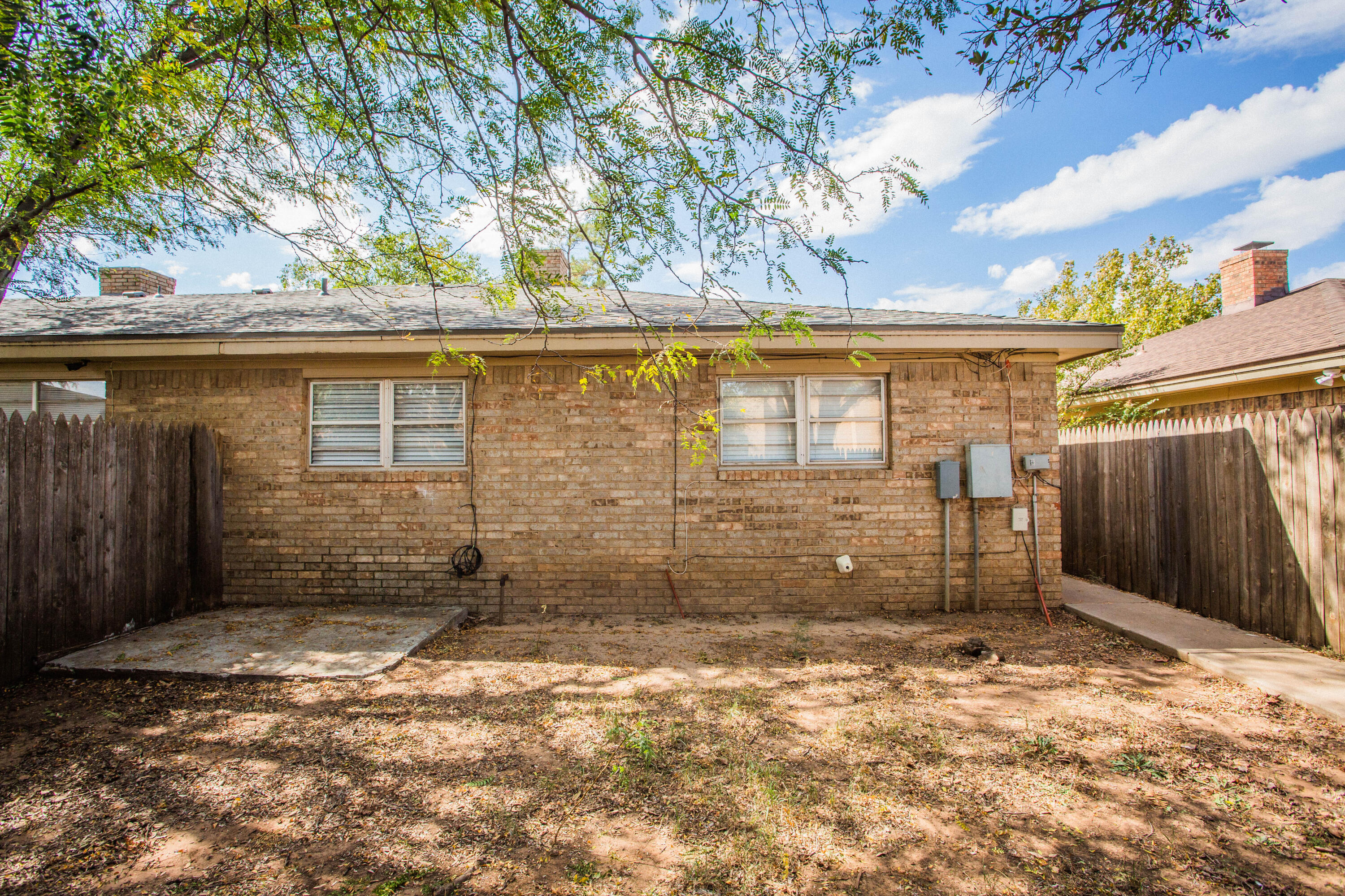 7903 Aberdeen Avenue Lubbock, TX 79424 - Photo 34 of 47 a view of a backyard of the house