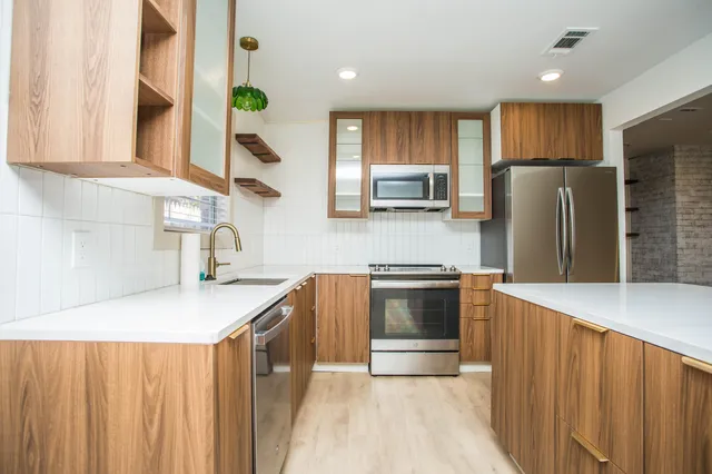 a view of a backyard of the house