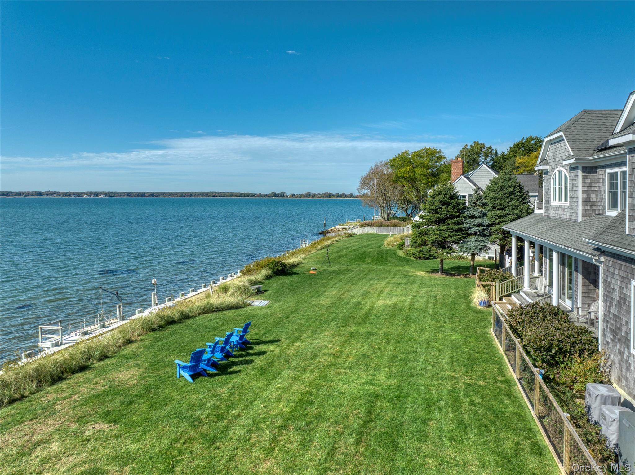 a view of a lake with a big yard